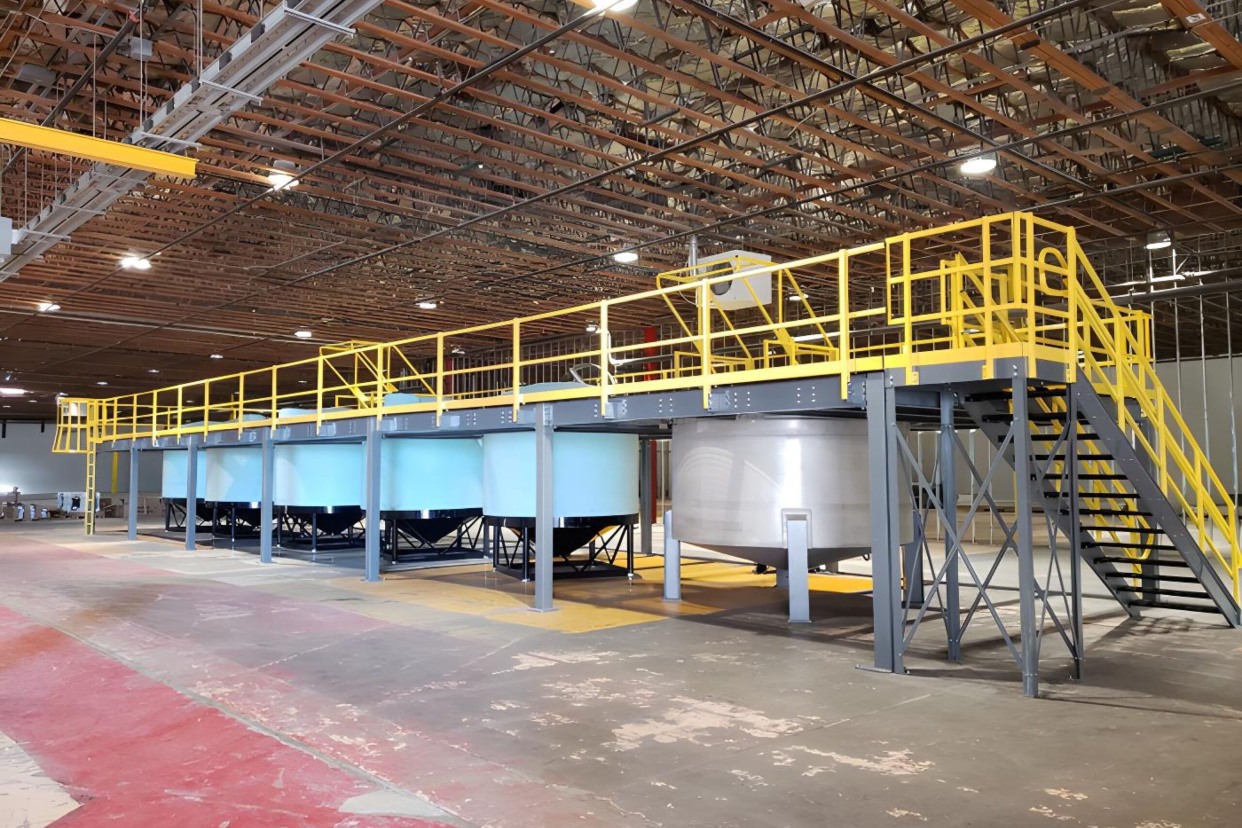 A steel mezzanine structure helps optimize warehouse space