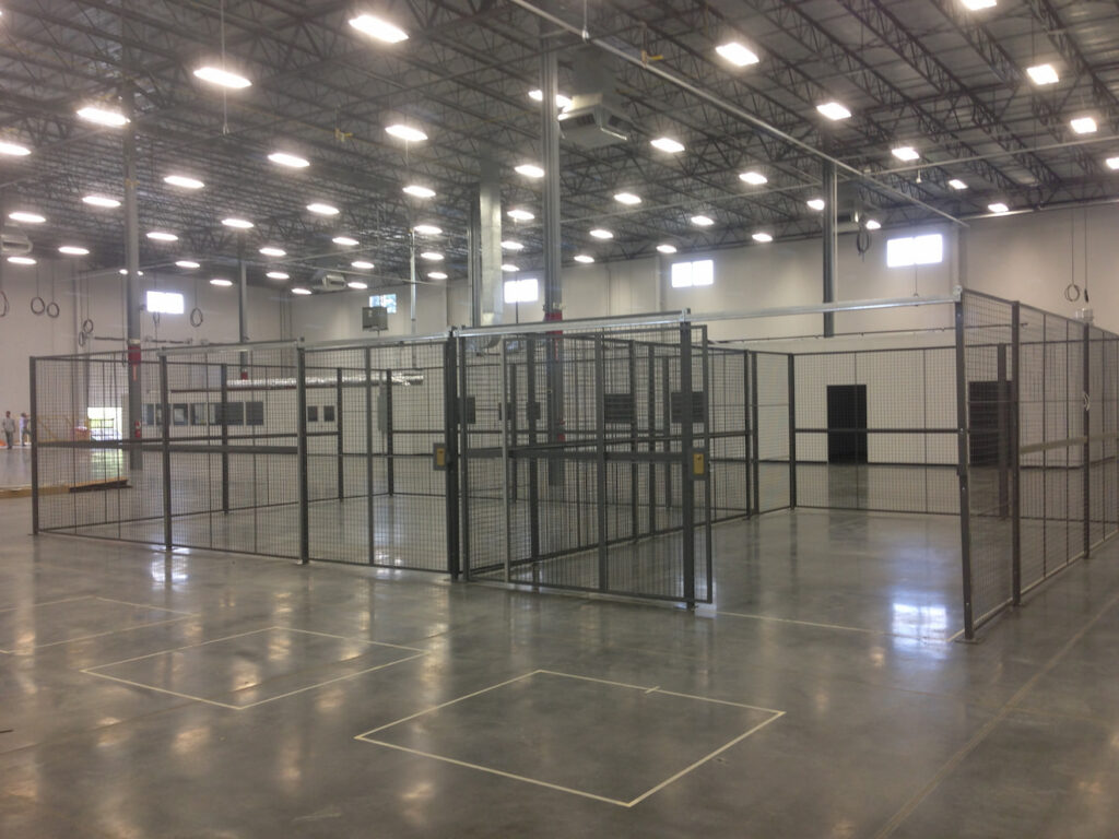 Full view of a large custom built wire mesh partition by KABTech Corp