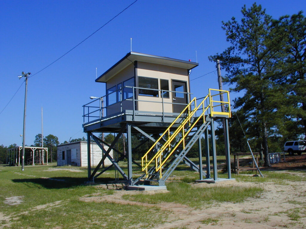 A pre-fabricated guardhouse placed on a raised platform from KABTech