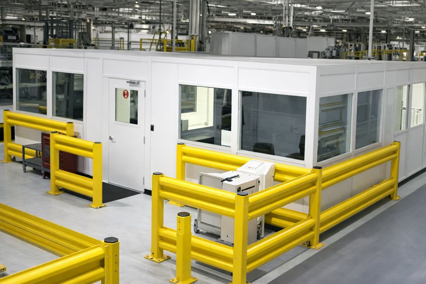 Prefabricated Warehouse Office Protected by Yellow Barrier Railing