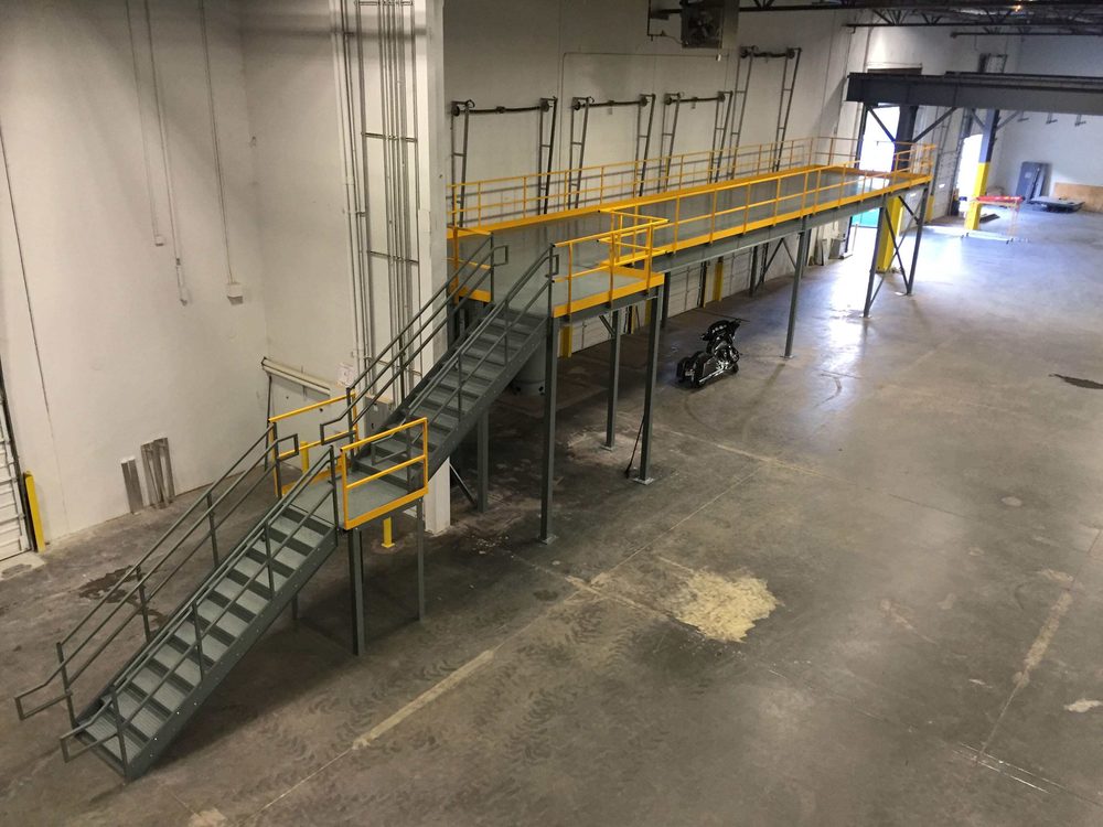 A custom-designed prefabricated set of metal stairs and walkways